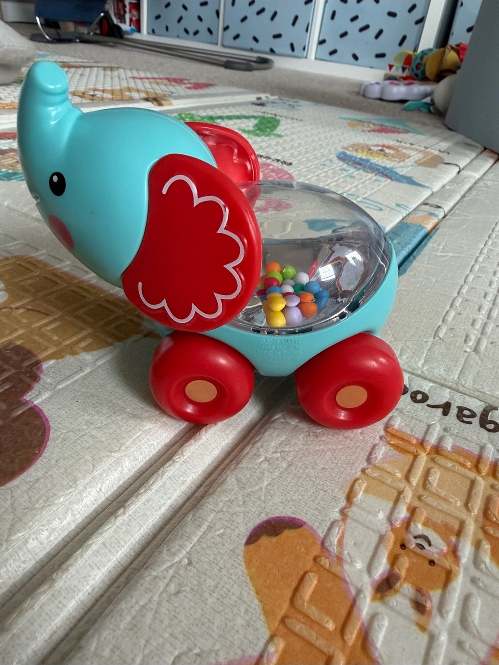 Fisher-Price Teal and Red Rolling Elephant Rattle